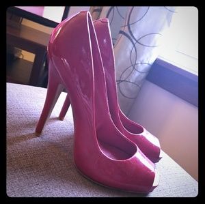 Red patent leather pumps